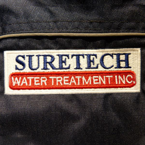 Suretech embroidered logo